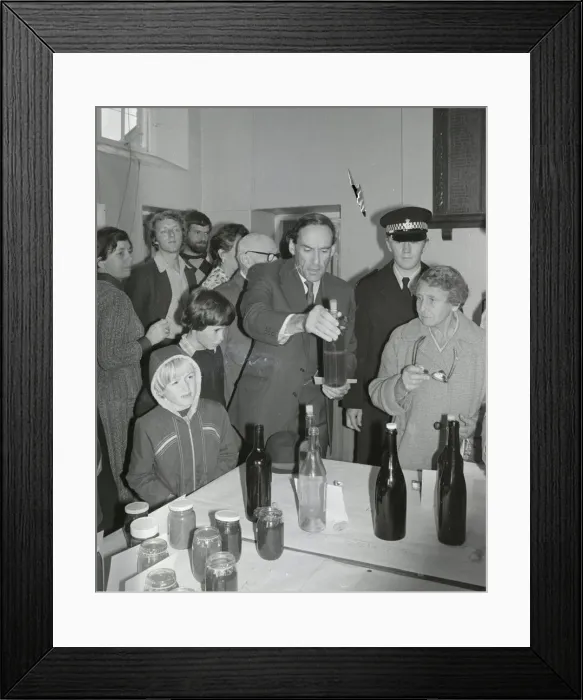 Framed Print : Liberal Party leader Jeremy Thorpe looking at bottles as he visits a flower show Framed Print : Liberal Party leader Jeremy Thorpe looking at bottles as he visits a flower show