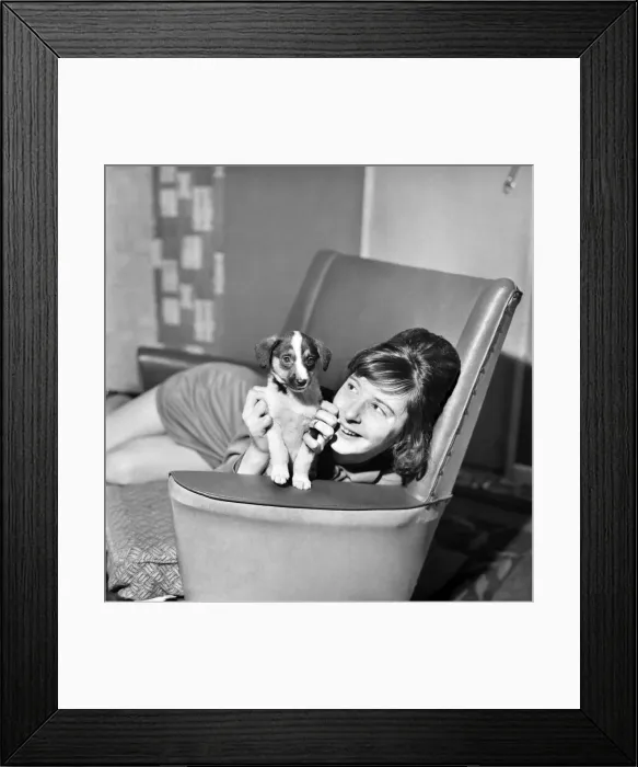 Framed Print : Teenager Cathy Rowntree aged 19 and puppy Patches