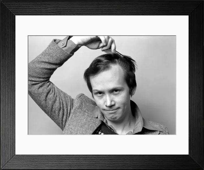 Framed Print : Man combing his hair. July 1975 75-00177-003 Framed Print : Man combing his hair. July 1975 75-00177-003