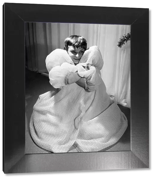 Peeping through this glamorous negligee in fancy nylon tricot