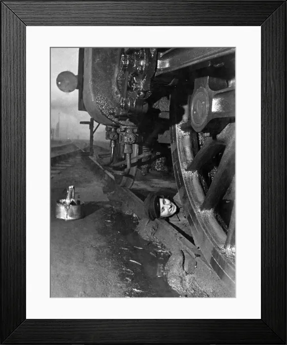 Framed Print : Ignorant of future health and safety rules, this keen femail engine cleaner literally Framed Print : Ignorant of future health and safety rules, this keen femail engine cleaner literally