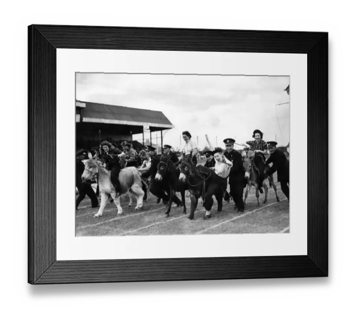 Framed Print : The donkey Derby, in progress, the jockeys were girls drawn from the different areas of