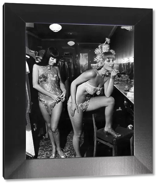 Two cabaret girls put theor make up on before going on stage. August 1975 P012715