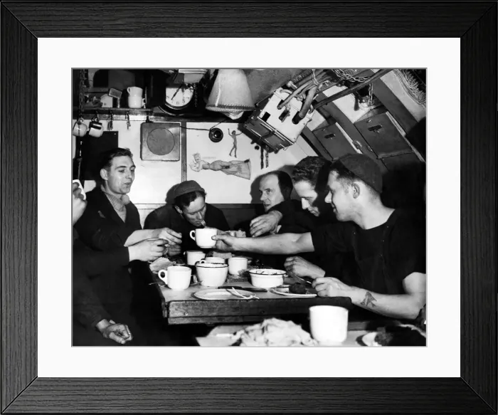 Framed Print : Royal Navy at War. Members of the crew gather in the submarine mess room Framed Print : Royal Navy at War. Members of the crew gather in the submarine mess room