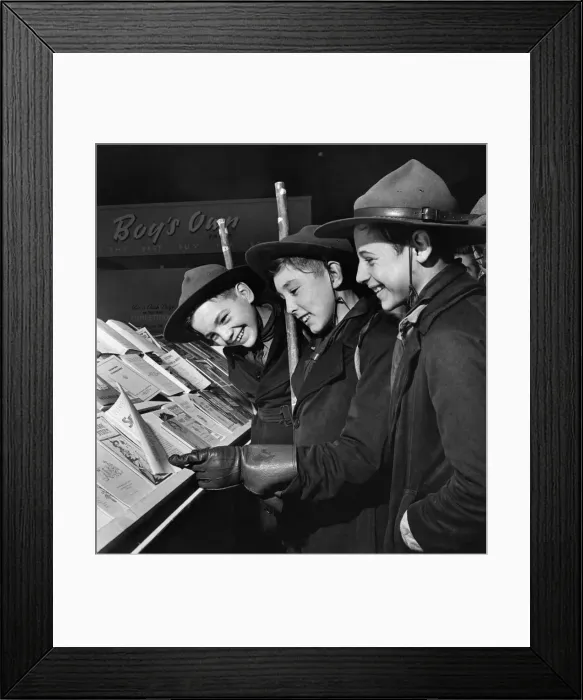 Framed Print : Boy Scouts had a busmans holiday'reading pamphlets about the Scout Framed Print : Boy Scouts had a busmans holiday'reading pamphlets about the Scout
