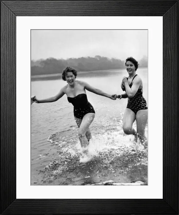 Framed Print : Two teen-age nurses, Ann Attewell and Jill Dellow, put down their thermometers