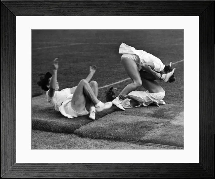 Framed Print : N. F. S. girls perform their agility show at the Wembly Stadium. August 1943 P012240 Framed Print : N. F. S. girls perform their agility show at the Wembly Stadium. August 1943 P012240