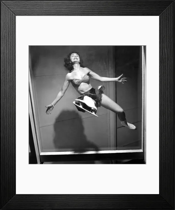 Framed Print : Ice Skater Jane Conlon practices on a see through floor. October 1953 D6656-003