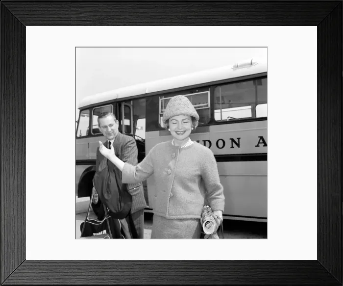 Framed Print : Olivia De Havilland seen here at London Airport after flying in from Paris