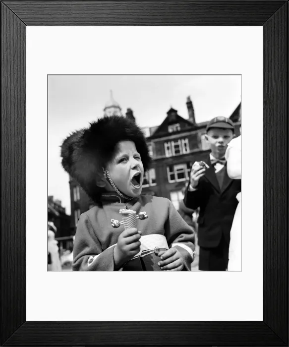 Framed Print : Whit Walks Manchester. June 1960 M4383-012A young boy dressed as a soldier enjoys his Ice Framed Print : Whit Walks Manchester. June 1960 M4383-012A young boy dressed as a soldier enjoys his Ice