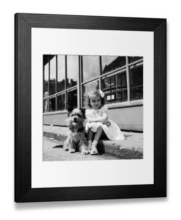 Framed Print : Whit Walks Manchester: The little girl who brought her dog along to walk in the Whit Framed Print : Whit Walks Manchester: The little girl who brought her dog along to walk in the Whit
