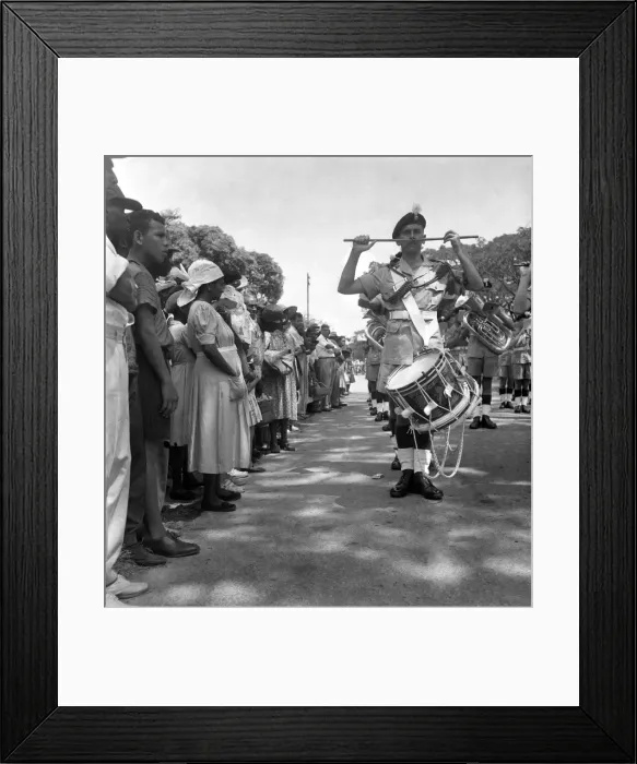 Framed Print : British soldiers marching in Georgetown, British Guiana watched by local citizens