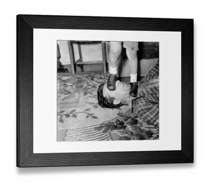 Framed Print : Familys: Voilence. Stuntman Steve Donohue seen here having a Mock Fight with his daughter Framed Print : Familys: Voilence. Stuntman Steve Donohue seen here having a Mock Fight with his daughter