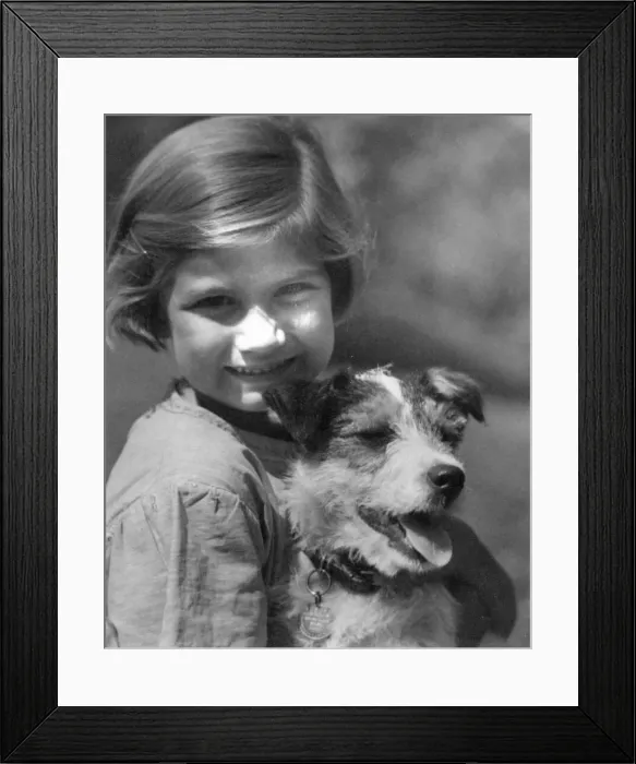 Framed Print : Young girl with pet dog Circa 1945 P044453