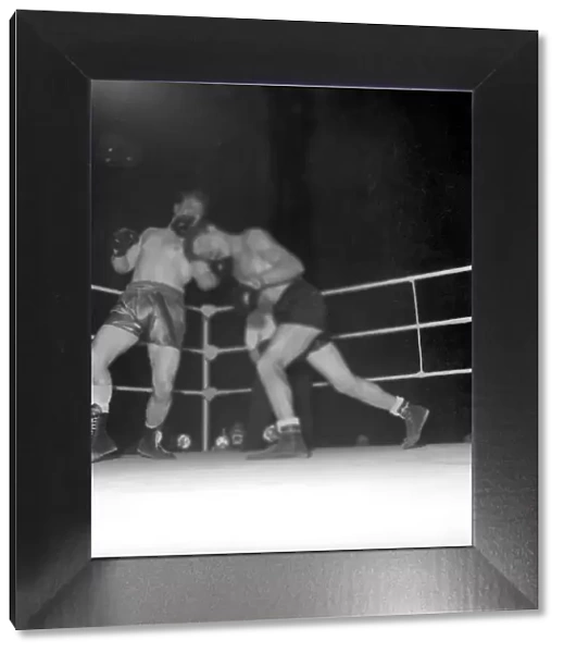 Sport Boxing. The fight between Jack Hobbs (blue shorts yellow stripe