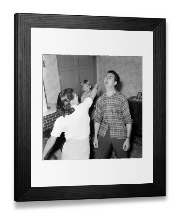 Framed Print : Familys: Voilence. Stuntman Steve Donohue seen here having a Mock Fight with his daughter Framed Print : Familys: Voilence. Stuntman Steve Donohue seen here having a Mock Fight with his daughter