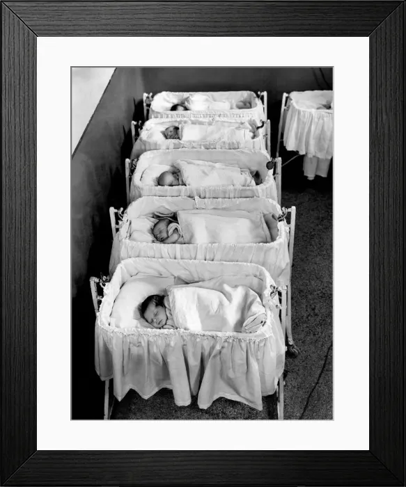 Framed Print : Babies in Nursery at University College Hospital. In the nursery. October 1943 P009457 Framed Print : Babies in Nursery at University College Hospital. In the nursery. October 1943 P009457