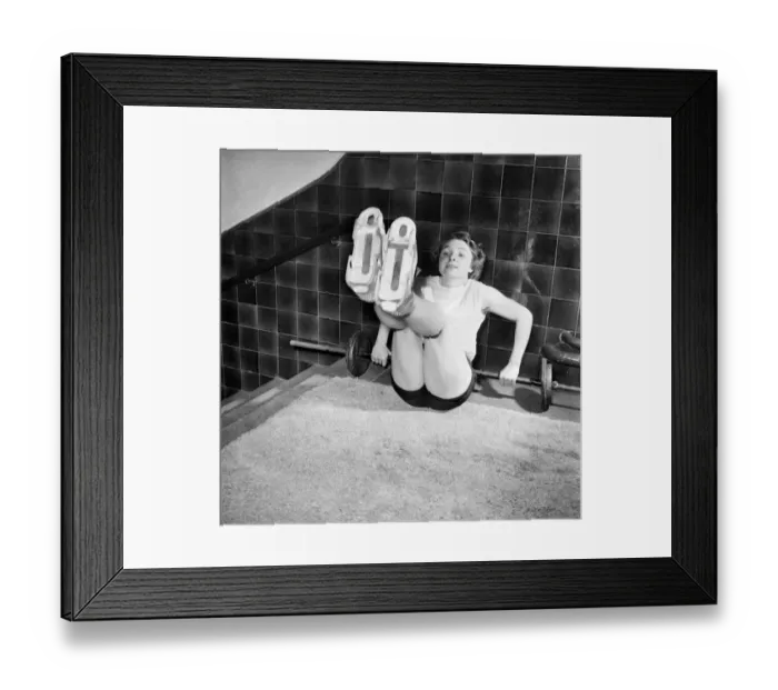 Framed Print : Metal boots to give her more speed. Schoolgirl with metal boots is schoolgirl champion Framed Print : Metal boots to give her more speed. Schoolgirl with metal boots is schoolgirl champion