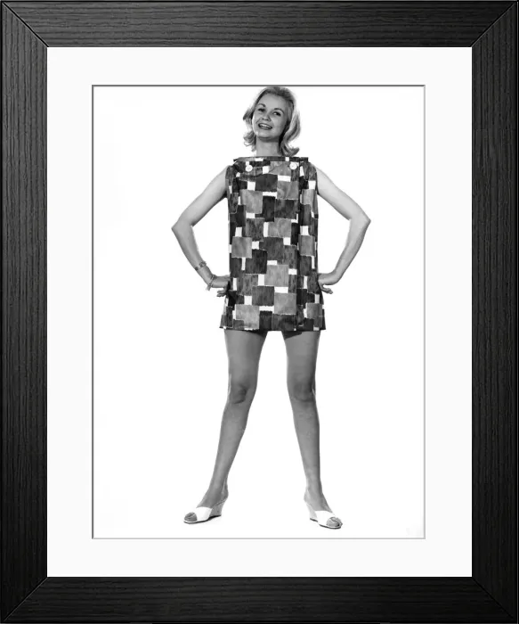Framed Print : Model Wendy Tripp wearing sleeveless patterned mini dress