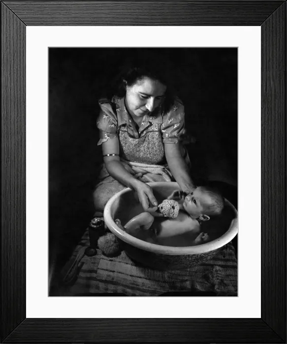 Framed Print : Mother Janet Trayler washing her 4 weeks old baby. August 1943 P009458 Framed Print : Mother Janet Trayler washing her 4 weeks old baby. August 1943 P009458