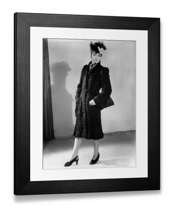 Framed Print : Furs. This black Persian lamb, semi-tailored model does things