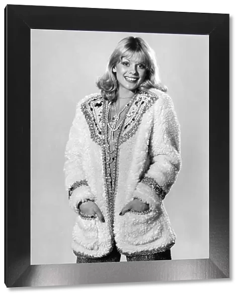 Model Sharron Lynne wearing fluffy cardigan, hands in pockets