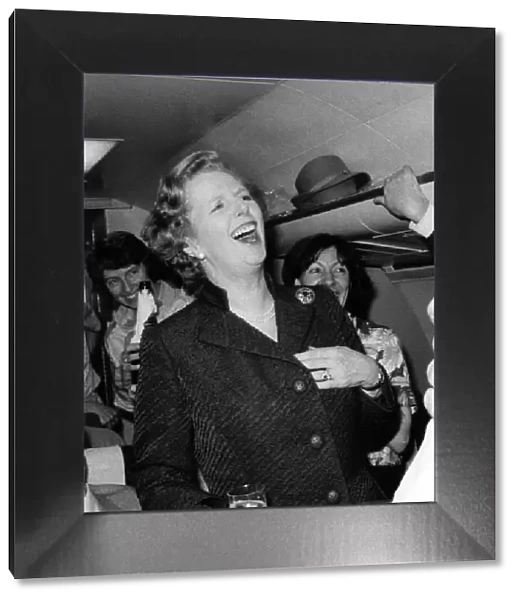 Buoyant. Mrs. Thatcher on polling day eve with the Party faithful. June 1983 P009158