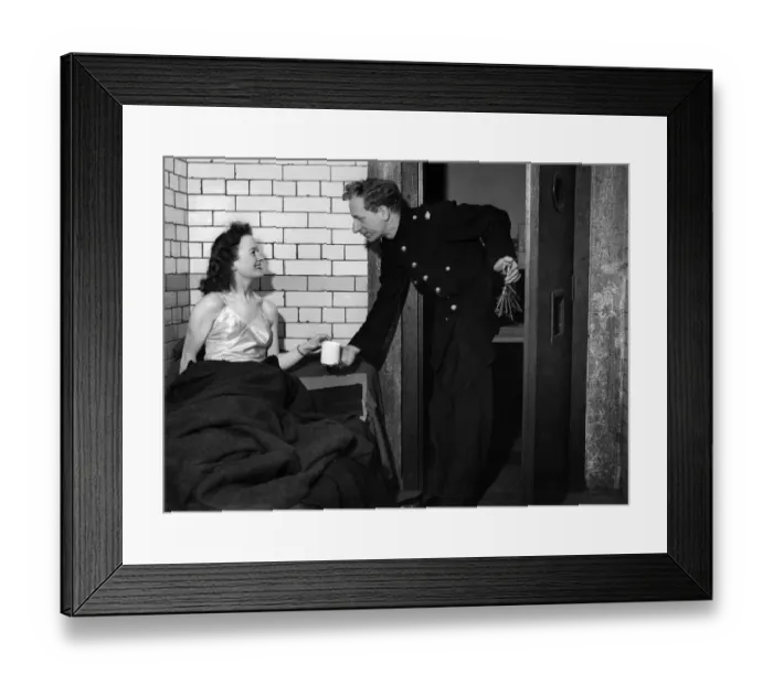 Framed Print : Your tea, madame'says the Lake District constable as he opens up the cells to Framed Print : Your tea, madame'says the Lake District constable as he opens up the cells to
