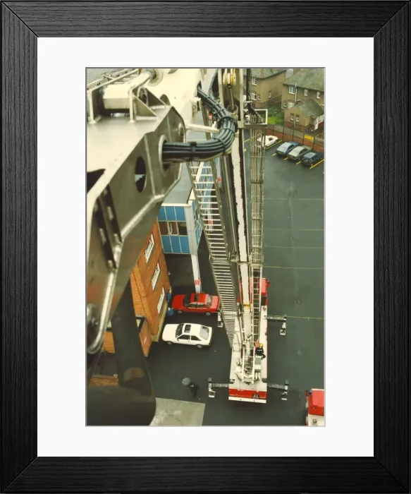 Framed Print : Firefighters practice rescue routines using one of their turntable ladders Framed Print : Firefighters practice rescue routines using one of their turntable ladders