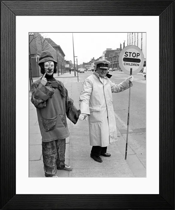 Framed Print : Stephanie Fagan in full clown war paint meets and makes friends with a nervous lollipop Framed Print : Stephanie Fagan in full clown war paint meets and makes friends with a nervous lollipop