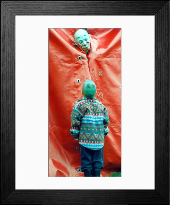 Framed Print : Nolilay Kormiltseve of the Moscow State Circus performing for his audience of one Framed Print : Nolilay Kormiltseve of the Moscow State Circus performing for his audience of one