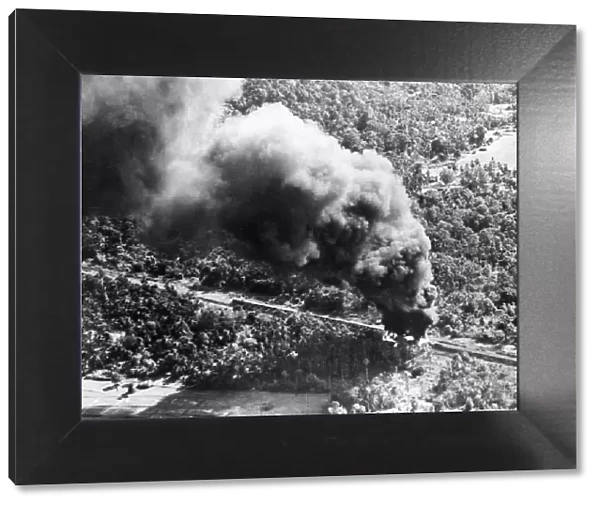 R. A. F Liberators bomb a Japanese train 15 miles south of Anim