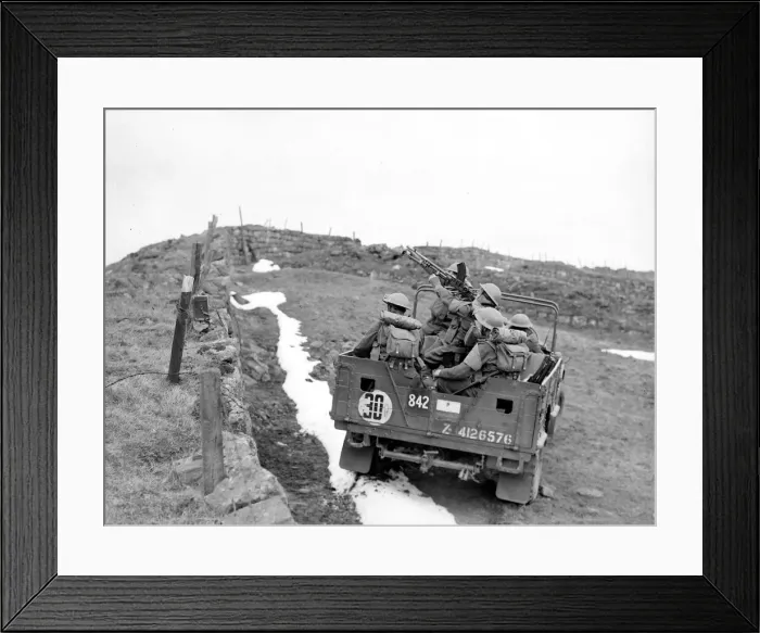 Framed Print : British army soldiers on the back of an all terrain vehicle with mounted Bren gun during