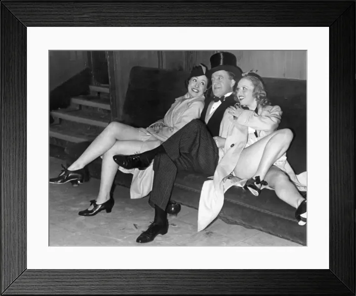 Framed Print : Comedian Tommy Handley with two modern girl secretaries at Jack Hylton Framed Print : Comedian Tommy Handley with two modern girl secretaries at Jack Hylton