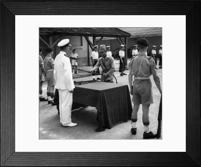 Framed Print : Japanese Navy surrender their weapons. Saigon is handed over to the British Navy Framed Print : Japanese Navy surrender their weapons. Saigon is handed over to the British Navy