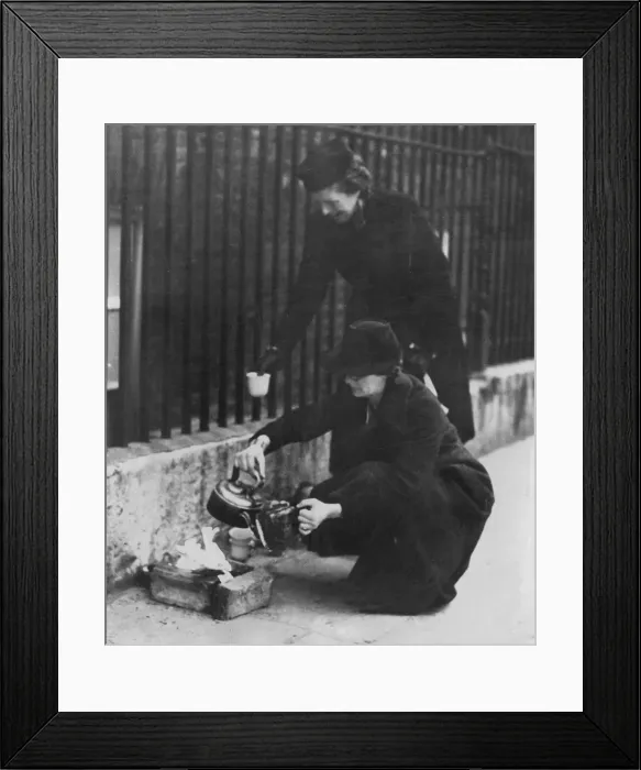 Framed Print : Women residents of London making themselves a little fire for a morning cup of tea in Framed Print : Women residents of London making themselves a little fire for a morning cup of tea in