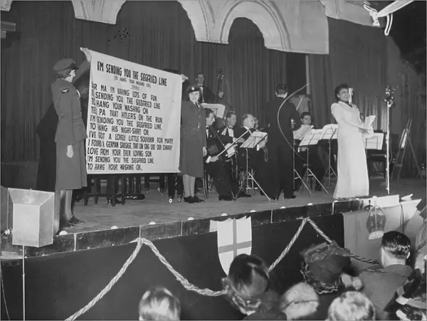 famous American jazz singer and entertainer ADELAIDE HALL performing on stage at an ENSA