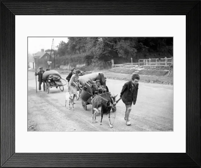 Framed Print : Dispalced French families returning to the town of Faliaise in Normandy