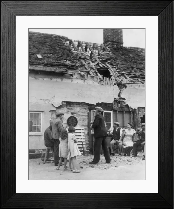Framed Print : Life carries on as usual at a country pub in England. Locals enjoying a pint of beer Framed Print : Life carries on as usual at a country pub in England. Locals enjoying a pint of beer