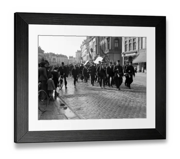 Framed Print : Last line of recruits called up going into action. Belgian troops marching down street