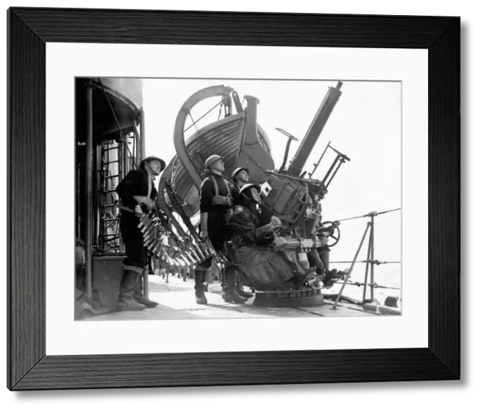 Framed Print : British Royal Navy sailors aboard a destroyer on escort duty fire warning shots to an Framed Print : British Royal Navy sailors aboard a destroyer on escort duty fire warning shots to an