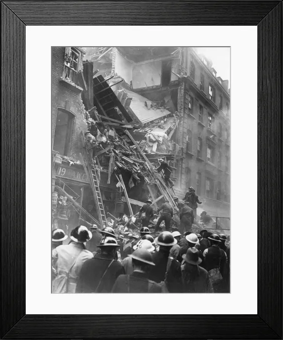 Framed Print : Damaged buildings are inspected after air raid in London. 5th December 1941 Framed Print : Damaged buildings are inspected after air raid in London. 5th December 1941