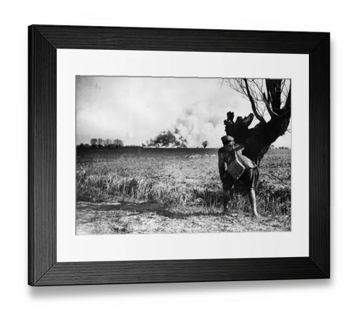 Framed Print : British official observes from a distance the destruction of an amminition dump beforev