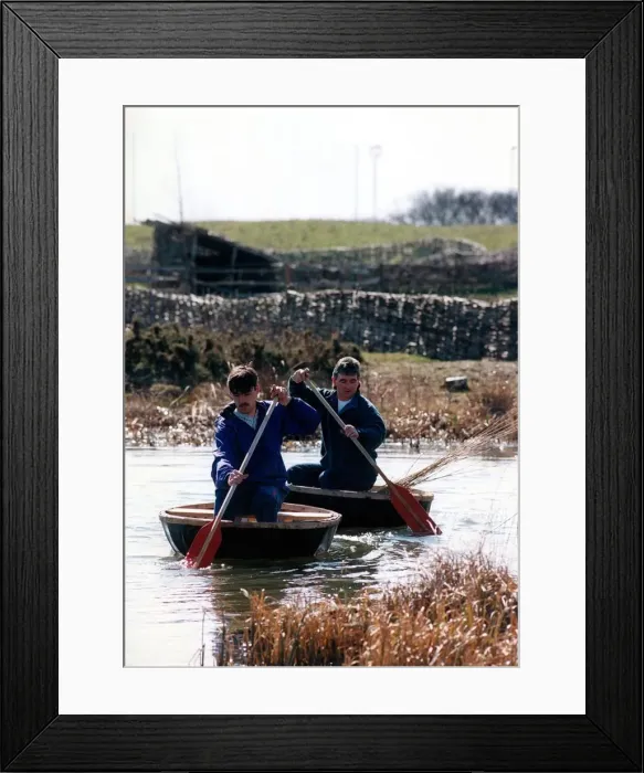 Framed Print : Danny Gilchrist and Dave Potts on the pond at Bedes World in Jarrow with their coracles Framed Print : Danny Gilchrist and Dave Potts on the pond at Bedes World in Jarrow with their coracles