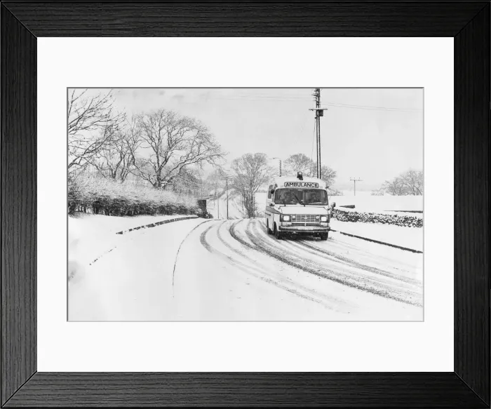 Framed Print : An ambulance speeds to an emergency call-out on the Greenside to Chopwell Road in Framed Print : An ambulance speeds to an emergency call-out on the Greenside to Chopwell Road in