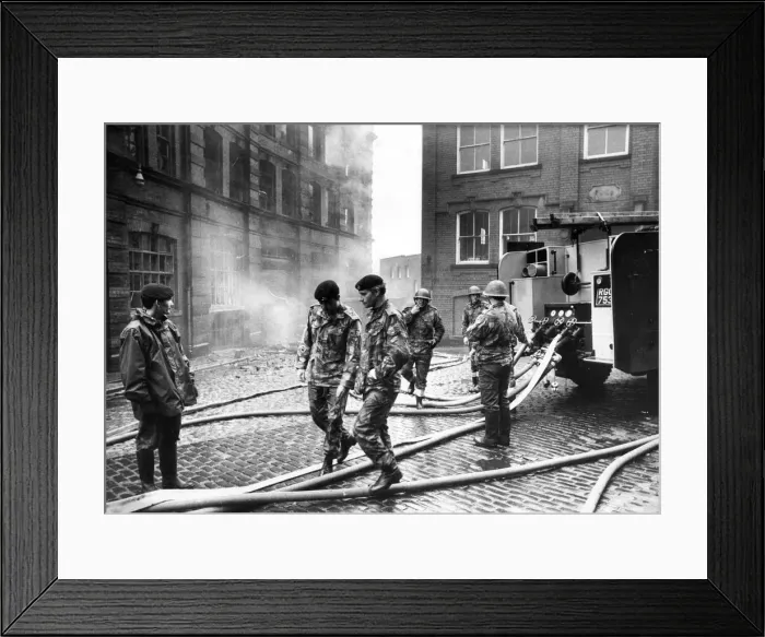 Framed Print : Army personnel take over the duties of the firefighter during the firemen