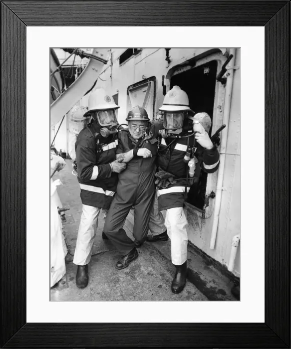 Framed Print : Firefighters taking part in a training exercise aboard former destroyer HMS Cavalier Framed Print : Firefighters taking part in a training exercise aboard former destroyer HMS Cavalier