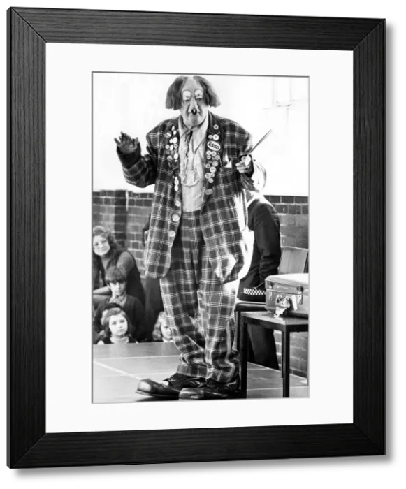 Framed Print : Coco the clown turns serious at Walkergate Junior School, Newcastle Framed Print : Coco the clown turns serious at Walkergate Junior School, Newcastle