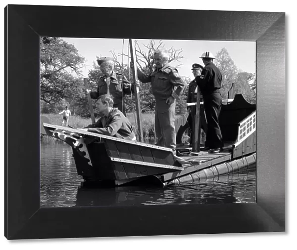 The cast of the wartime comedy series Dads Army take to the water during the filming of