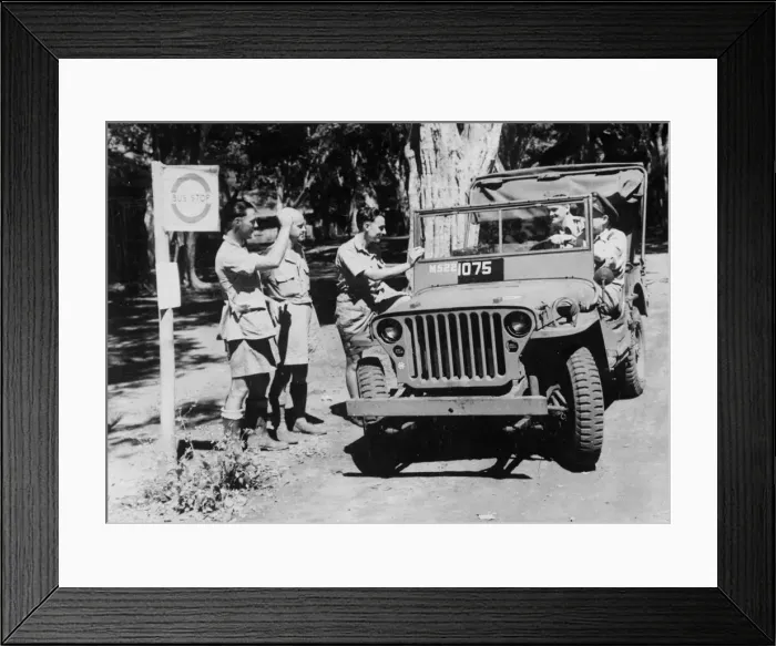 Framed Print : Royal Air force squadron leader driving his jeep is halted for alift at an RAF Airfield Framed Print : Royal Air force squadron leader driving his jeep is halted for alift at an RAF Airfield